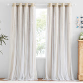 NICETOWN Kids Blackout Curtains front view with star cutouts for a cozy nursery ambiance.