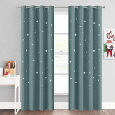 NICETOWN star cut out curtain closeup of silver grommets for easy installation.