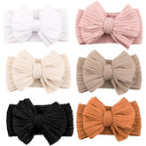 Niceye baby headbands with white nylon bows for comfy everyday wear.
