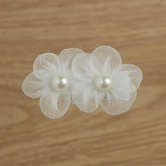 Nihao Baby baptism-friendly clip securing delicate toddler hair during ceremonies