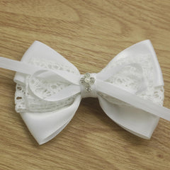 Nihao Baby ivory and pink lace bows for dress coordination.