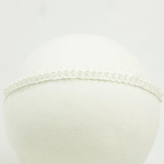 Nihao Baby headband white flower design adds cute charm to every outfit.