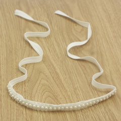 Nihao Baby newborn headband white bow showcases tiny dainty styling for baptisms.