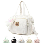 NIKUKY baby diaper bag tote featuring quilted nylon for lightweight, durable everyday use.