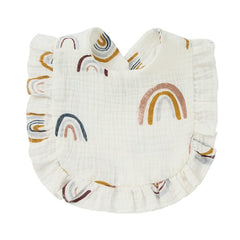 Nishine baby wearing drool bib shows secure button closure and comfy fit