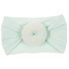 Nishine elastic turban-style headwraps offer secure fit for 0-5 year olds.
