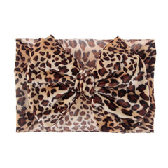 Nishine leopard headwrap color swatches show five bright options.