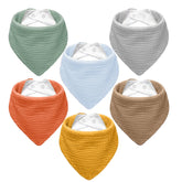 NISXABEBE muslin bib front view with soft fabric and color variety.