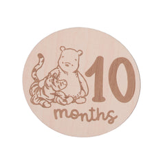 NoJo Winnie the Pooh milestone 2 months card captures growing moments in warm wood tones