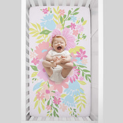 NoJo Floral Burst close-up fabric shows 100% cotton texture for gentle baby skin.