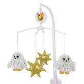 NoJo Hedwig plush owls on a spinning mobile for bedtime.
