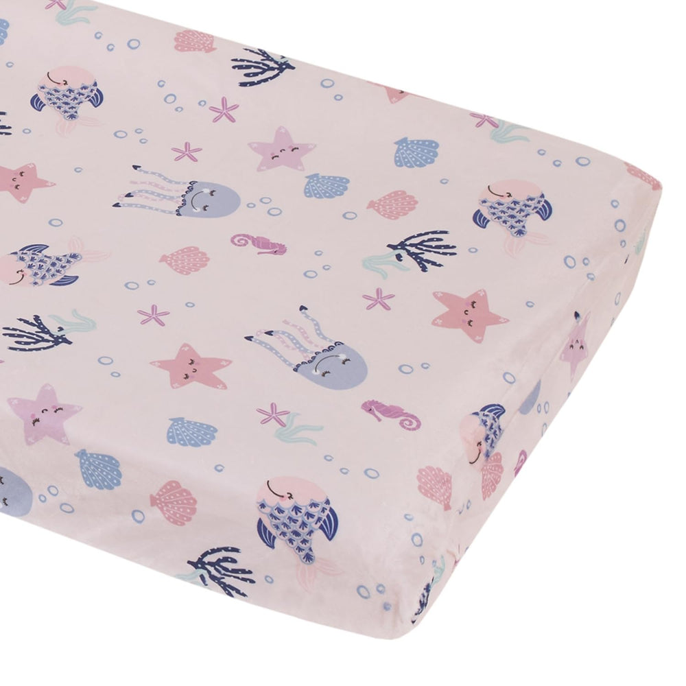 NoJo Mermaid Lagoon Pink changing pad cover adds playful color while protecting the pad.