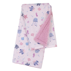 NoJo blanket showcases pink and blue sea creatures for on-the-go comfort.