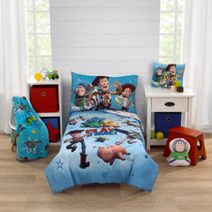 NoJo Toy Story comforter featuring Woody and Buzz for cozy toddler bedtime