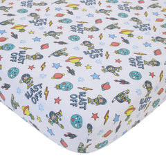 NoJo Buzz Lightyear countdown text on crib skirt adds playful detail.