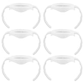 Nonarttoy bottle handles secure a baby's grip for easy self-feeding transitions.