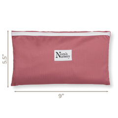 Nora's Nursery dual-sided pad showing waterproof and bamboo absorbent surfaces