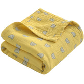 NTBAY 4-layer muslin blanket folded; soft, breathable newborn comfort.