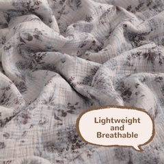 NTBAY baby swaddle on crib, lightweight blanket provides cozy coverage.