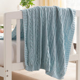 NTBAY cotton cable knit toddler blanket in blue, soft and breathable.