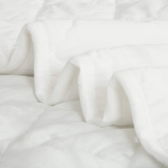 NTBAY crib blanket in nursery setting for snug daytime naps