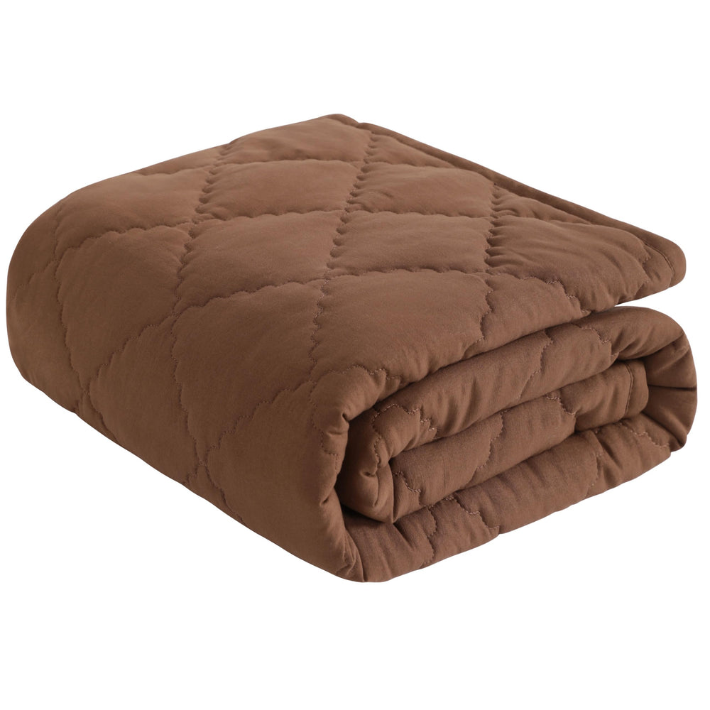 NTBAY down-alternative toddler comforter brown folded, cozy warmth for bedtime.
