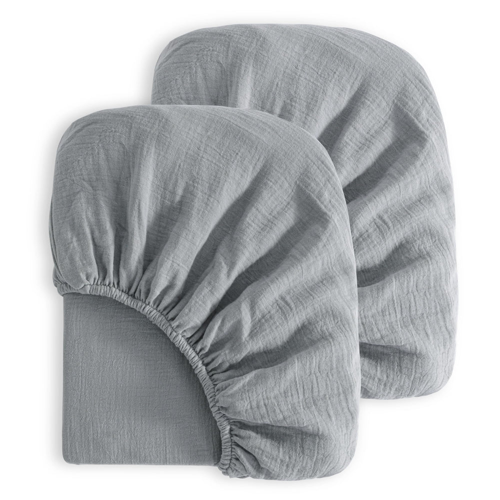 NTBAY muslin crib sheet two-pack in gray offers breathable comfort for nap time.