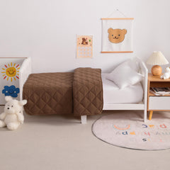 NTBAY nursery comforter in bed brown shows neutral decor fit.
