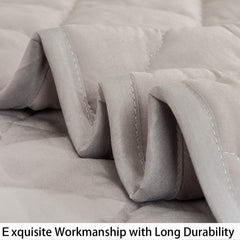 NTBAY smoke grey comforter in a nursery demonstrates versatile crib and travel use.