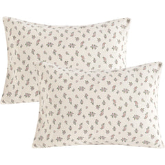 NTBAY toddler pillowcase close-up shows soft pink-ivory floral pattern and jersey cotton texture