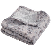 NTBAY two-layer muslin blanket front view, soft and breathable for newborns.