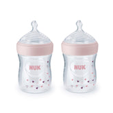 NUK Simply Natural 5 oz bottle with pink hearts offers comfortable grip.