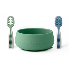 NumNum GOOtensils stage one teether beside the suction bowl for gentle starters.