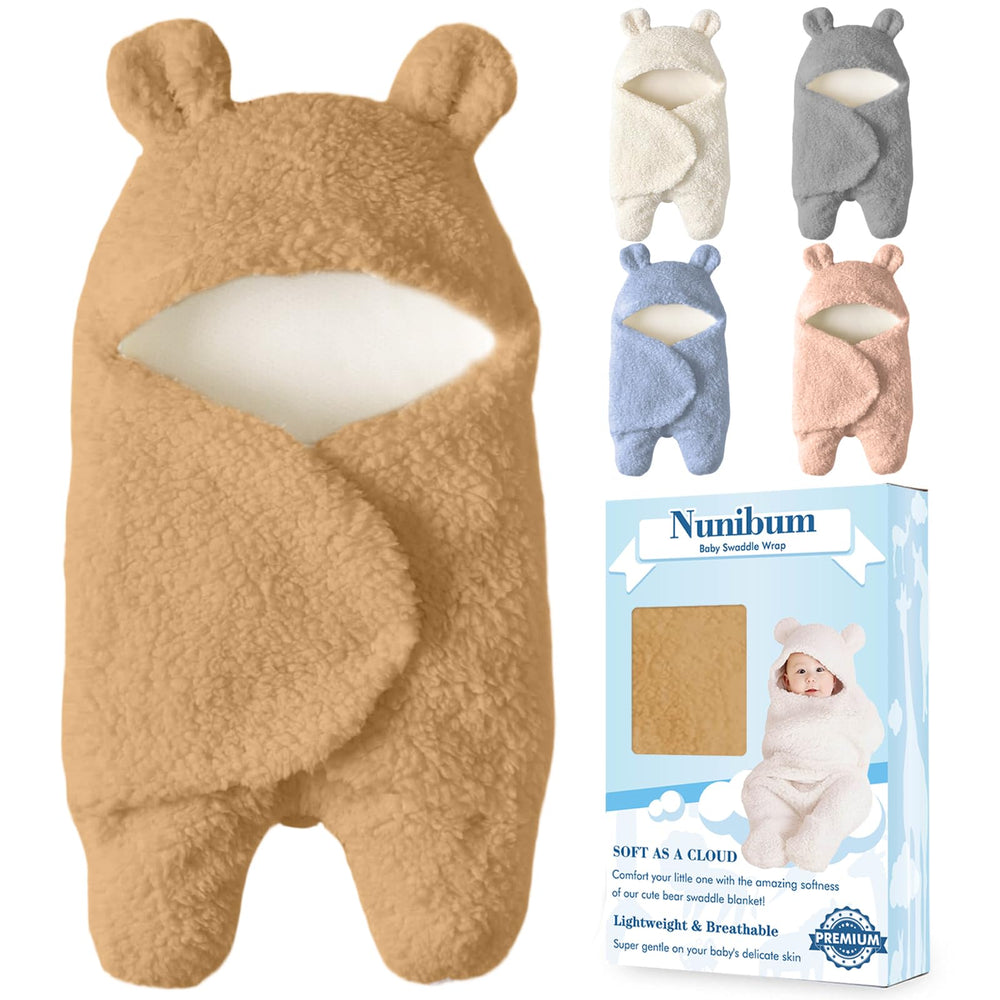 Nunibum Bear Hood Swaddle in brown with a cozy bear-ear design for peaceful baby sleep