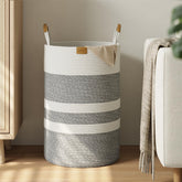 Nunsino 75L striped laundry hamper with leather handles for easy transport.