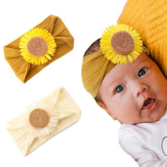 NUOSYI yellow flower headband on a baby, soft nylon for gentle wear.