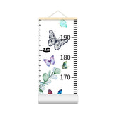 Nustila butterfly growth chart hangs on wall for precise height tracking in the nursery.