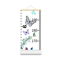 Nustila butterfly growth chart hangs on wall for precise height tracking in the nursery.
