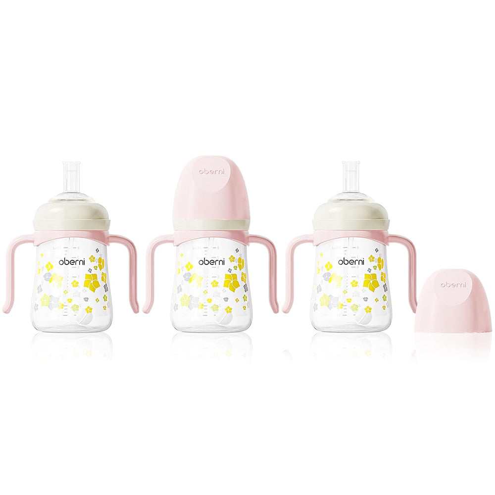 Oberni baby sippy cup 240ml pink full with leak-proof spout for mess-free meals.