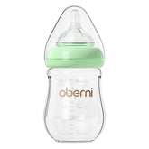 Oberni glass baby bottle green front view showing clear borosilicate glass