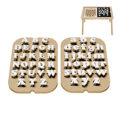 Ogears Alphabet Board Inserts on a sensory table for tactile letter play.