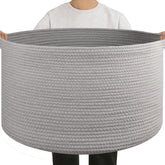 OIAHOMY 90L blanket basket with two sturdy handles for easy transport around the home.