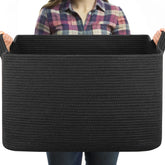 OIASKET 95L large blanket basket in black for easy storage in living rooms.