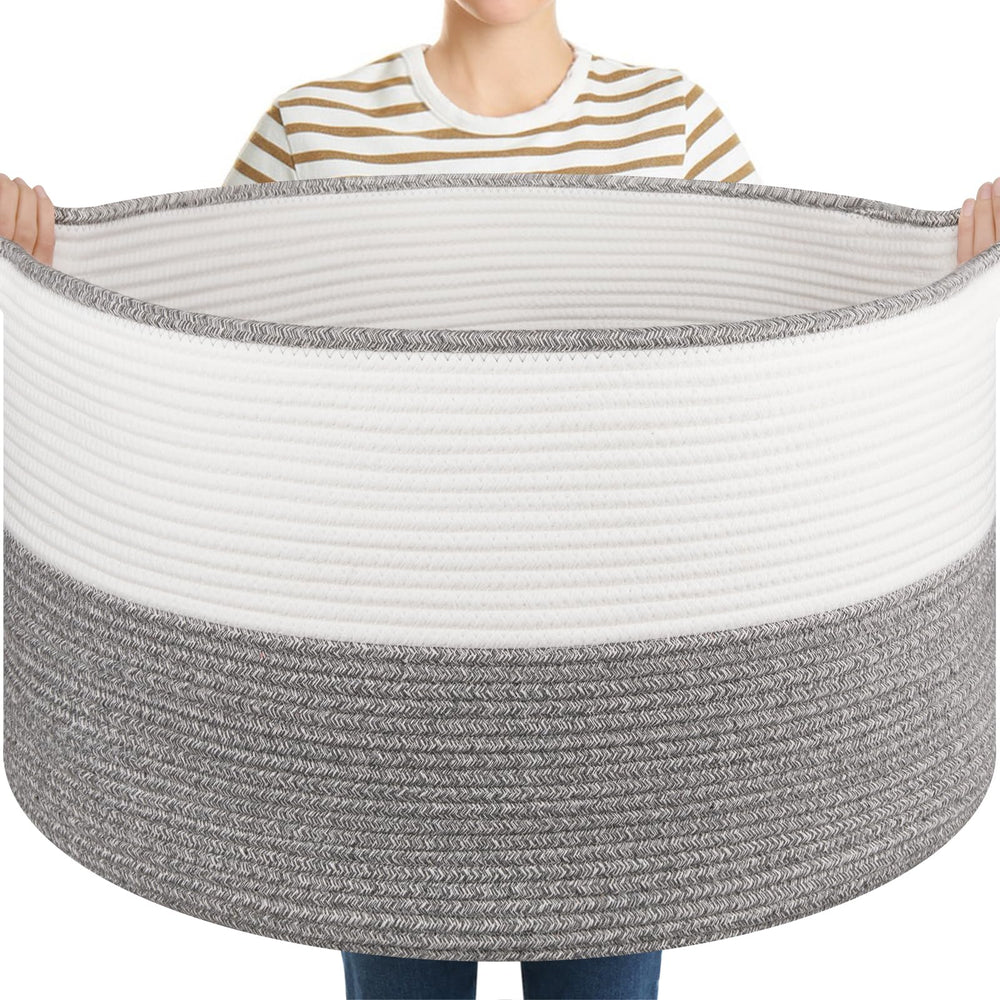 OIASKET blanket basket with handles in grey and white, ideal for easy living room organization.