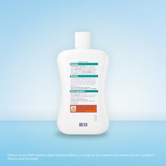 Bottle being poured into bath to create a soothing lather