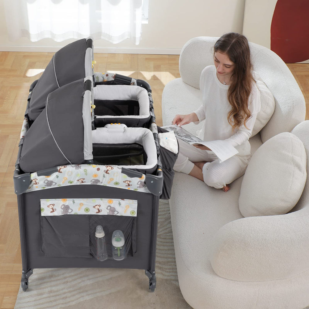 Okaytwins Twin Bassinet Setup with two portable bassinet attachments for flexible newborn sleep.