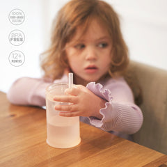 Olababy Clear View straw valve close-up demonstrating controlled flow for steady sipping