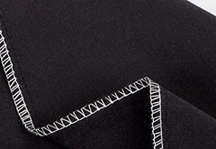 Om Bedding Collection envelope closure close-up showing secure pillowcase opening.