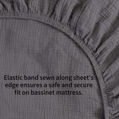 Elastic edge and deep pockets securing Onacosht bassinet sheet fit.