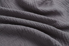 Pre-washed softness of Onacosht muslin bassinet sheets for gentle sleep